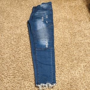 Women's distressed moto style jeans